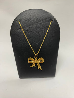 gold plated pendant chain with gold plated bow pendant