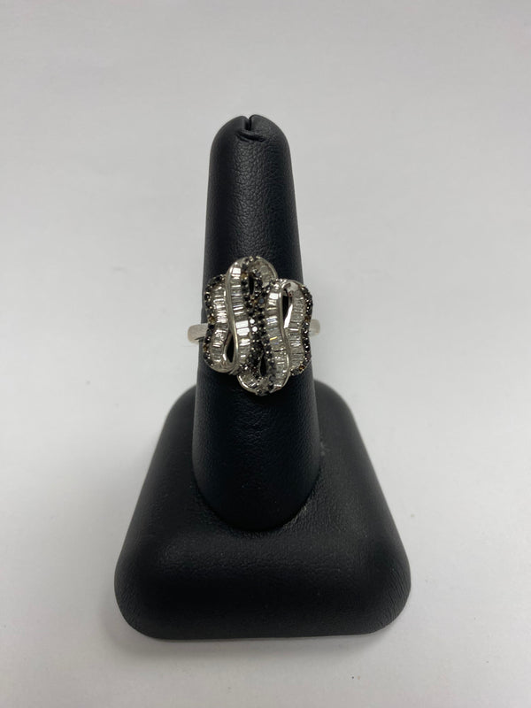 sterling silver ring with baggets and black stones